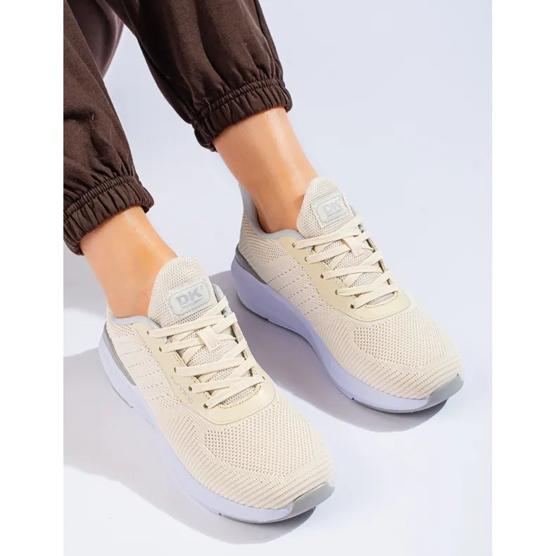 DK women's beige trainers