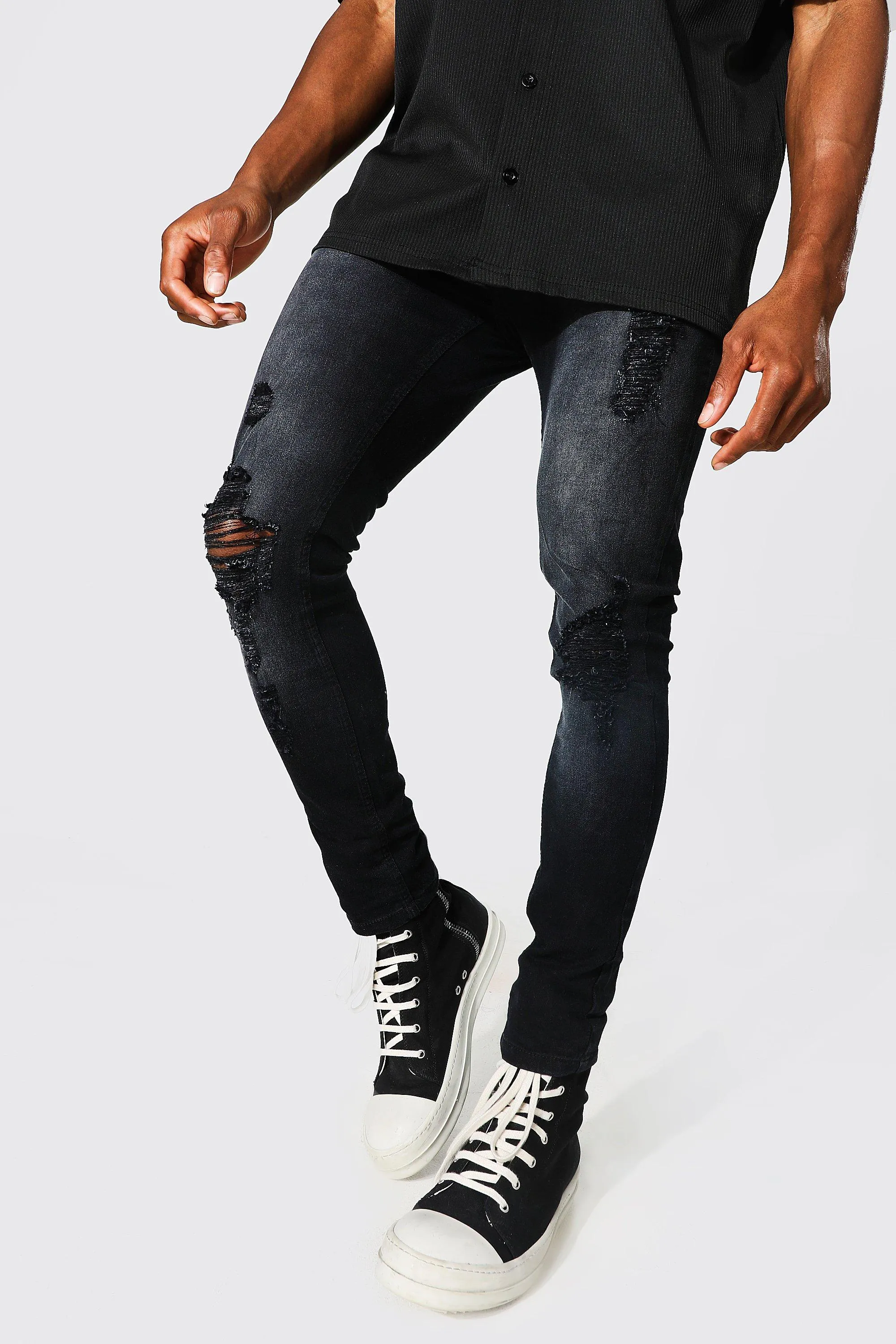 Super Skinny Busted Knee Distressed Jeans